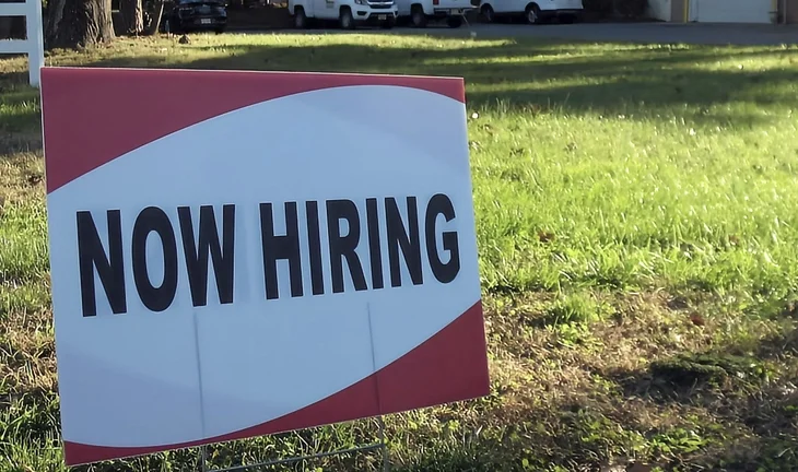A now hiring sign