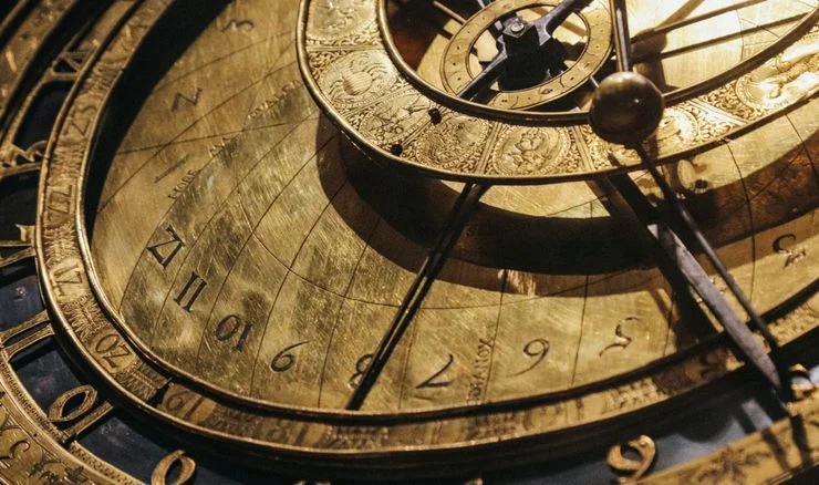 an ancient brass clock